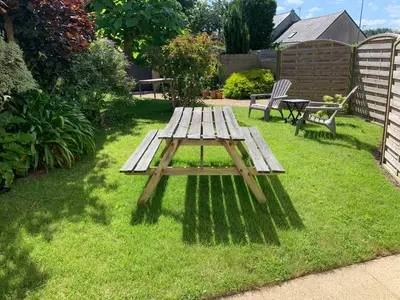 Jardin de l'établissement Appartement RDC de maison principale