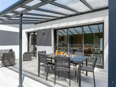 Coin salon dans l'établissement Holiday Home Palet Breton by Interhome