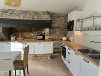 Cuisine ou kitchenette dans l'établissement La Ferme de Penanguer