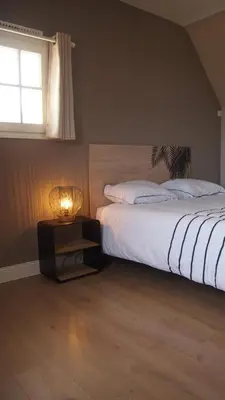 Un ou plusieurs lits dans un hébergement de l'établissement Belle villa à 150m de la plage.