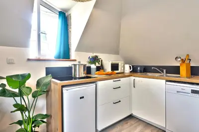 Cuisine ou kitchenette dans l'établissement Ty Koant au coeur du Guilvinec - Wifi inclus - Draps et serviettes inclus