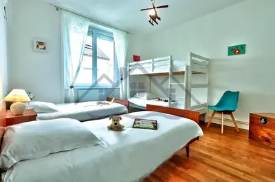 Un ou plusieurs lits dans un hébergement de l'établissement LocaLise - M8 - Ty Geoland - Maison à deux pas du centre avec jardin clos au Guilvinec - Wifi inclus - Animaux bienvenus- Linge de lit inclus