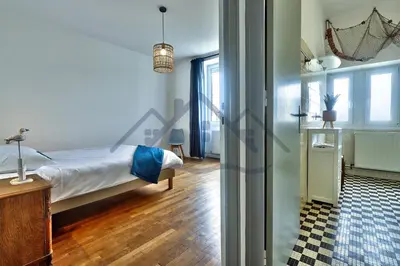 Un ou plusieurs lits dans un hébergement de l'établissement LocaLise - M8 - Ty Geoland - Maison à deux pas du centre avec jardin clos au Guilvinec - Wifi inclus - Animaux bienvenus- Linge de lit inclus