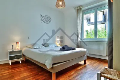 Un ou plusieurs lits dans un hébergement de l'établissement LocaLise - M8 - Ty Geoland - Maison à deux pas du centre avec jardin clos au Guilvinec - Wifi inclus - Animaux bienvenus- Linge de lit inclus