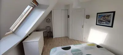 Un ou plusieurs lits dans un hébergement de l'établissement Chez la Québécoise - chambre d'hôtes