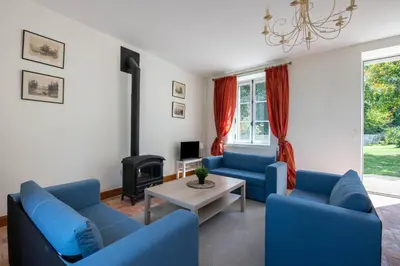 Coin salon dans l'établissement L'Annexe du Manoir - Vue mer
