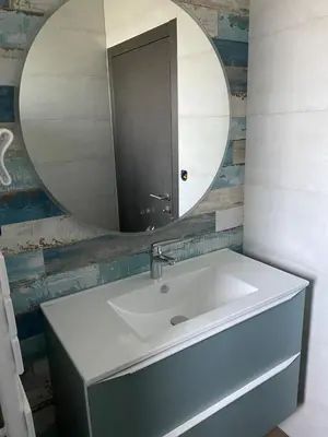 Salle de bains dans l'établissement L'Offshore