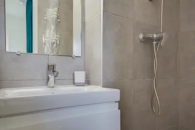 Salle de bains dans l'établissement Le Loriot
