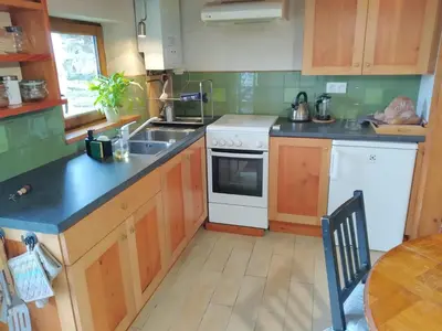 Cuisine ou kitchenette dans l'établissement Les Troglogîtes