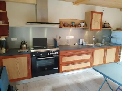 Cuisine ou kitchenette dans l'établissement Les Troglogîtes