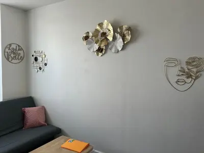 Coin salon dans l'établissement joli T1 avec parking gratuit