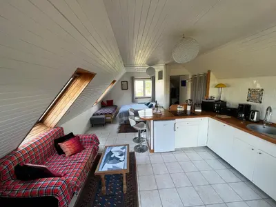 Coin salon dans l'établissement Le Penty de Kerfissien, Studio de plage 2 étoiles