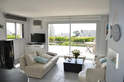 Coin salon dans l'établissement La Magnifique Villa à 500m de la plage