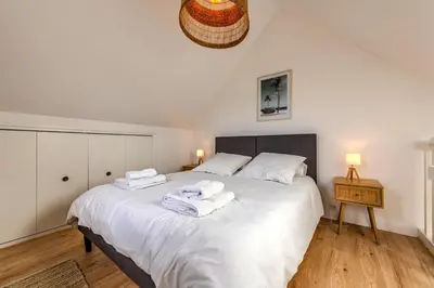 Un ou plusieurs lits dans un hébergement de l'établissement Villa Les 3D