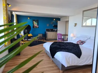 Un ou plusieurs lits dans un hébergement de l'établissement Les Suites du Dossen