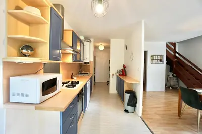 Cuisine ou kitchenette dans l'établissement L'authentique