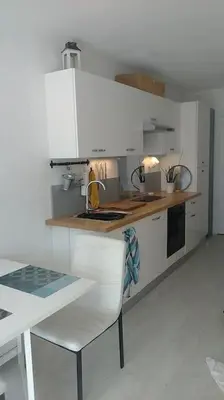 Cuisine ou kitchenette dans l'établissement Studio proche de la plage