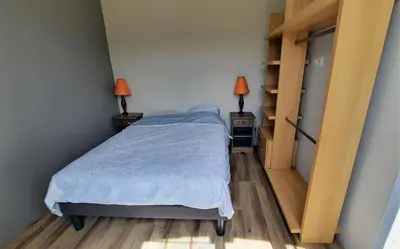 Un ou plusieurs lits dans un hébergement de l'établissement Jolie maison de campagne à 2km de la mer