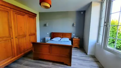 Un ou plusieurs lits dans un hébergement de l'établissement Jolie maison de campagne à 2km de la mer