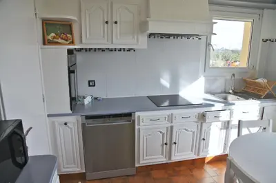 Cuisine ou kitchenette dans l'établissement Mer, belle vue, emplacement parfait, fonctionnel