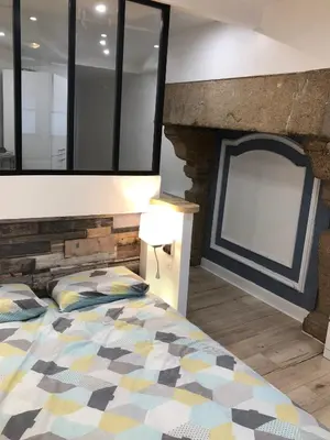 Un ou plusieurs lits dans un hébergement de l'établissement appartements centre historique de morlaix