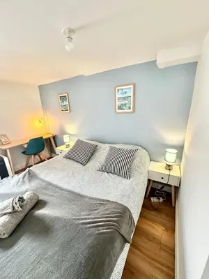 Un ou plusieurs lits dans un hébergement de l'établissement Appartements meublés Brest Gay Lussac
