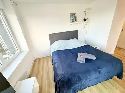 Un ou plusieurs lits dans un hébergement de l'établissement Appartements meublés Brest Gay Lussac