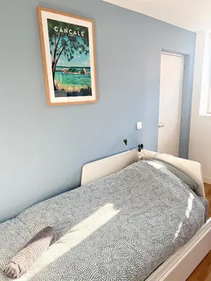 Un ou plusieurs lits dans un hébergement de l'établissement Appartements meublés Brest Gay Lussac