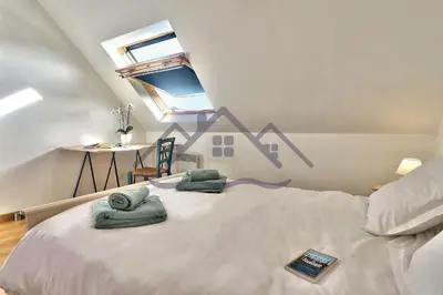 Un ou plusieurs lits dans un hébergement de l'établissement LocaLise - M12 -Ty Marjan - Vacances à quelques pas de la mer au Guilvinec - Wifi inclus - linge de lit inclus - Animaux bienvenus - Jardin avec possibilité d'être clos avec grillage