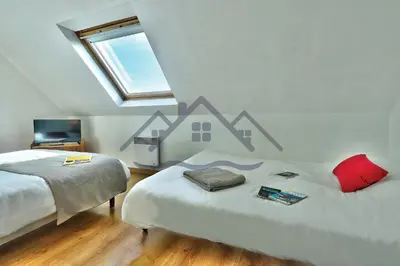 Un ou plusieurs lits dans un hébergement de l'établissement LocaLise - M12 -Ty Marjan - Vacances à quelques pas de la mer au Guilvinec - Wifi inclus - linge de lit inclus - Animaux bienvenus - Jardin avec possibilité d'être clos avec grillage