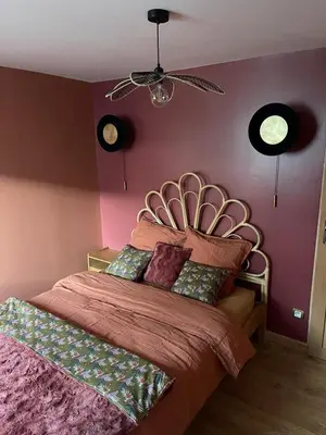 Un ou plusieurs lits dans un hébergement de l'établissement Chambre avec entrée privée