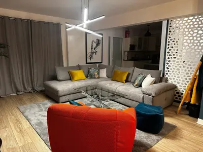 Coin salon dans l'établissement LES TEMPS HEUREUX proche du centre et plages