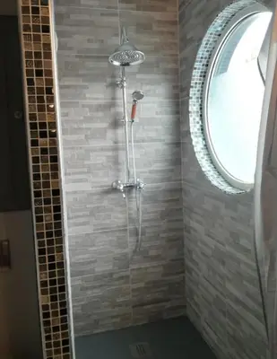 Salle de bains dans l'établissement A quelques pas du moulin blanc