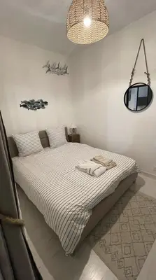Un ou plusieurs lits dans un hébergement de l'établissement Cosy et jardin panoramique