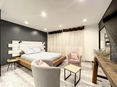 Coin salon dans l'établissement Dream Loft jacuzzi - sauna