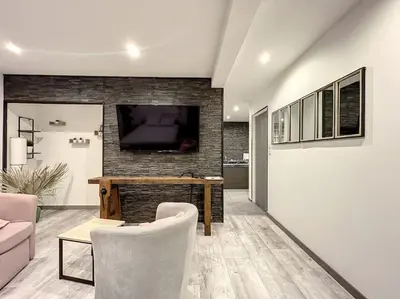 Télévision ou salle de divertissement dans l'établissement Dream Loft jacuzzi - sauna
