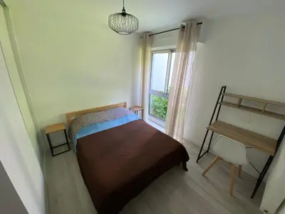 Un ou plusieurs lits dans un hébergement de l'établissement Magnifique appartement à deux pas du centre ville!