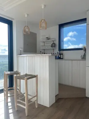 Cuisine ou kitchenette dans l'établissement Ty Dag - Grande Terre, front de mer et spa