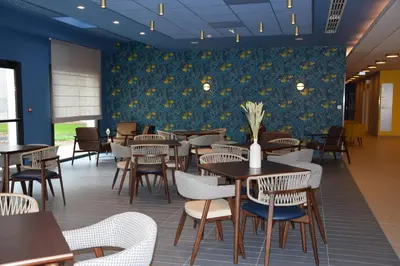 Restaurant ou autre lieu de restauration dans l'établissement DOMITYS LA CALYPSO