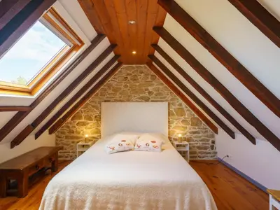 Un ou plusieurs lits dans un hébergement de l'établissement Holiday Home La petite Iroise by Interhome