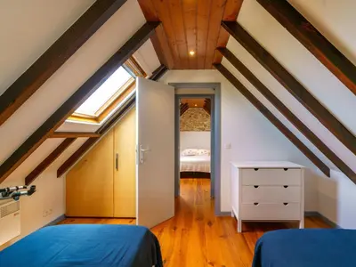 Un ou plusieurs lits dans un hébergement de l'établissement Holiday Home La petite Iroise by Interhome