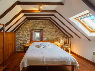 Un ou plusieurs lits dans un hébergement de l'établissement Holiday Home L'Iroise by Interhome
