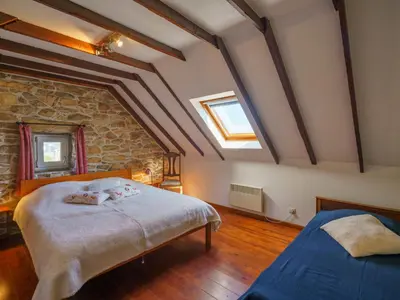 Un ou plusieurs lits dans un hébergement de l'établissement Holiday Home L'Iroise by Interhome