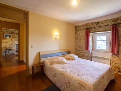 Un ou plusieurs lits dans un hébergement de l'établissement Holiday Home L'Iroise by Interhome