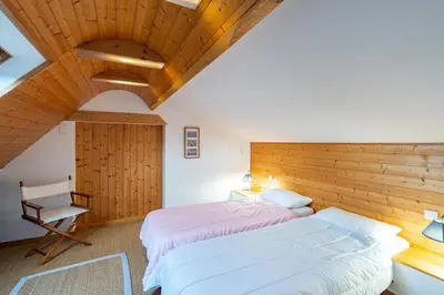Un ou plusieurs lits dans un hébergement de l'établissement Pont L'Abbé, maison avec jardin pour 4