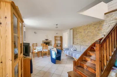 Coin salon dans l'établissement Pont L'Abbé, maison avec jardin pour 4