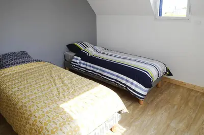 Un ou plusieurs lits dans un hébergement de l'établissement Holiday Home Morgat near Sandy Beach