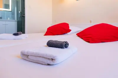 Un ou plusieurs lits dans un hébergement de l'établissement Hôtel de la Mairie