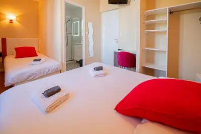 Un ou plusieurs lits dans un hébergement de l'établissement Hôtel de la Mairie