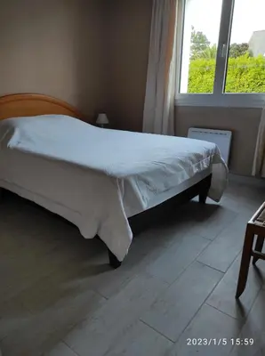 Un ou plusieurs lits dans un hébergement de l'établissement Er Mervent Maison de vacances
